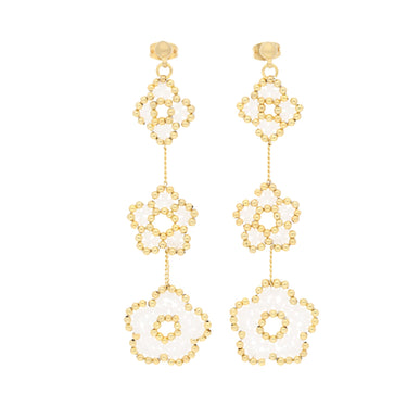 Aretes nomeolvides triples dorados.